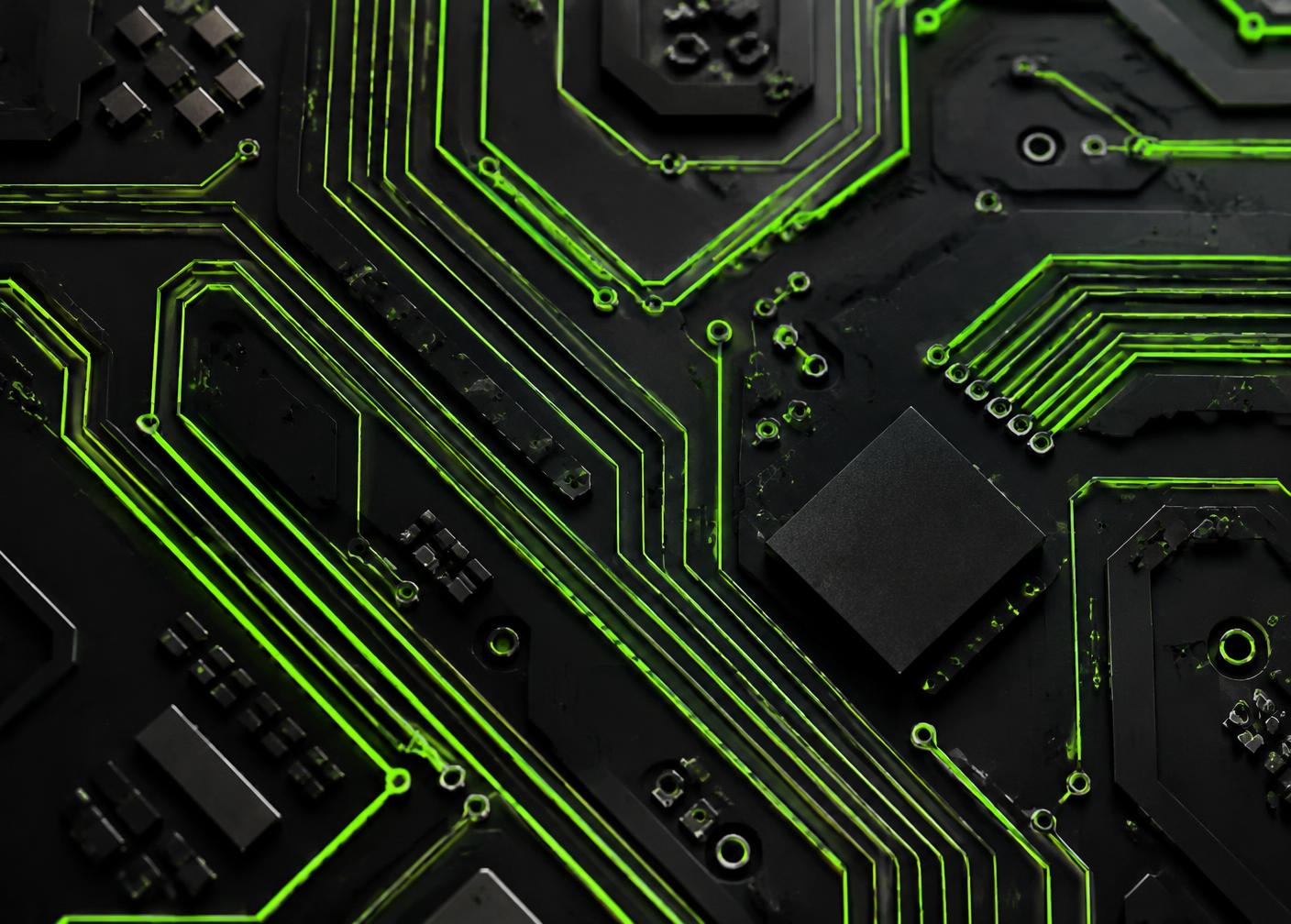 Macro view of a dark circuit board with glowing green traces